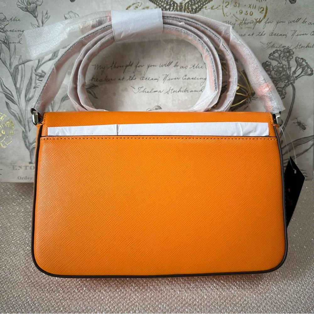 Kate Spade NY Sadie Envelope Crossbody in Turmeric Root Bright Orange K7338